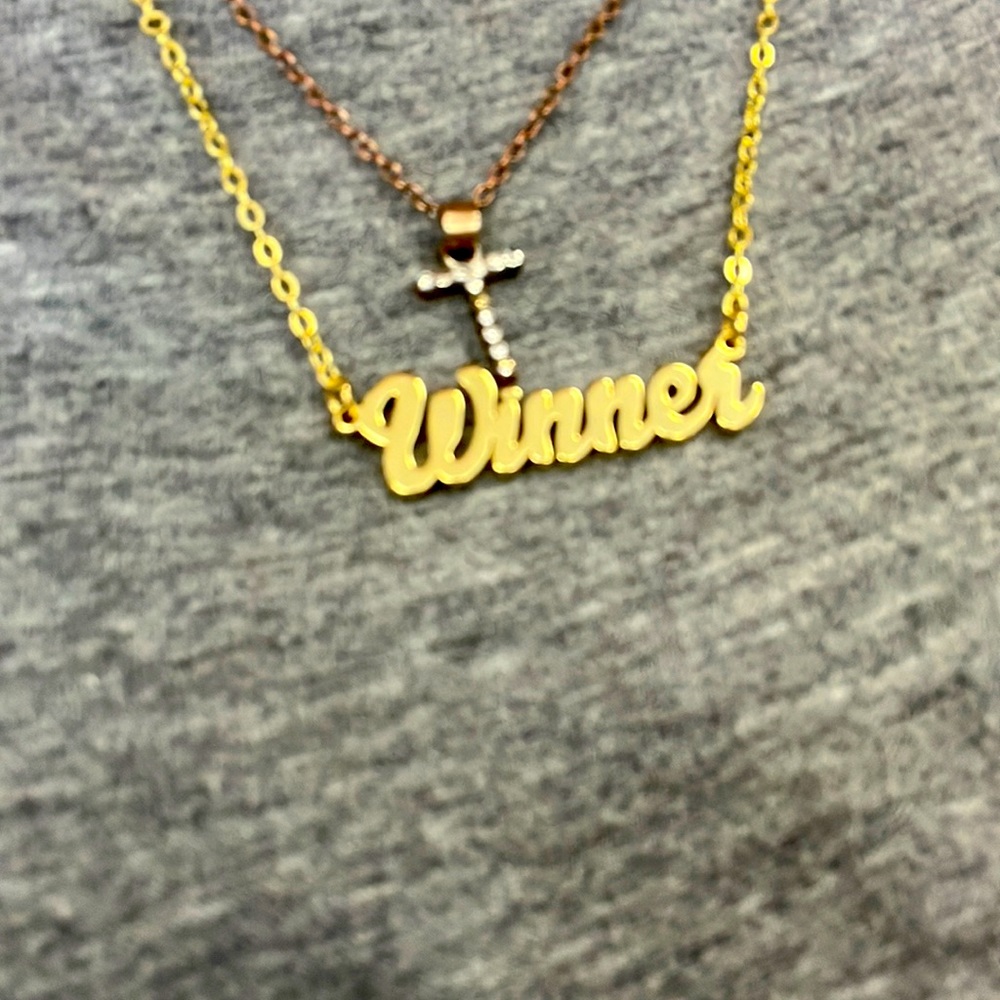 This is a necklace that says winner
